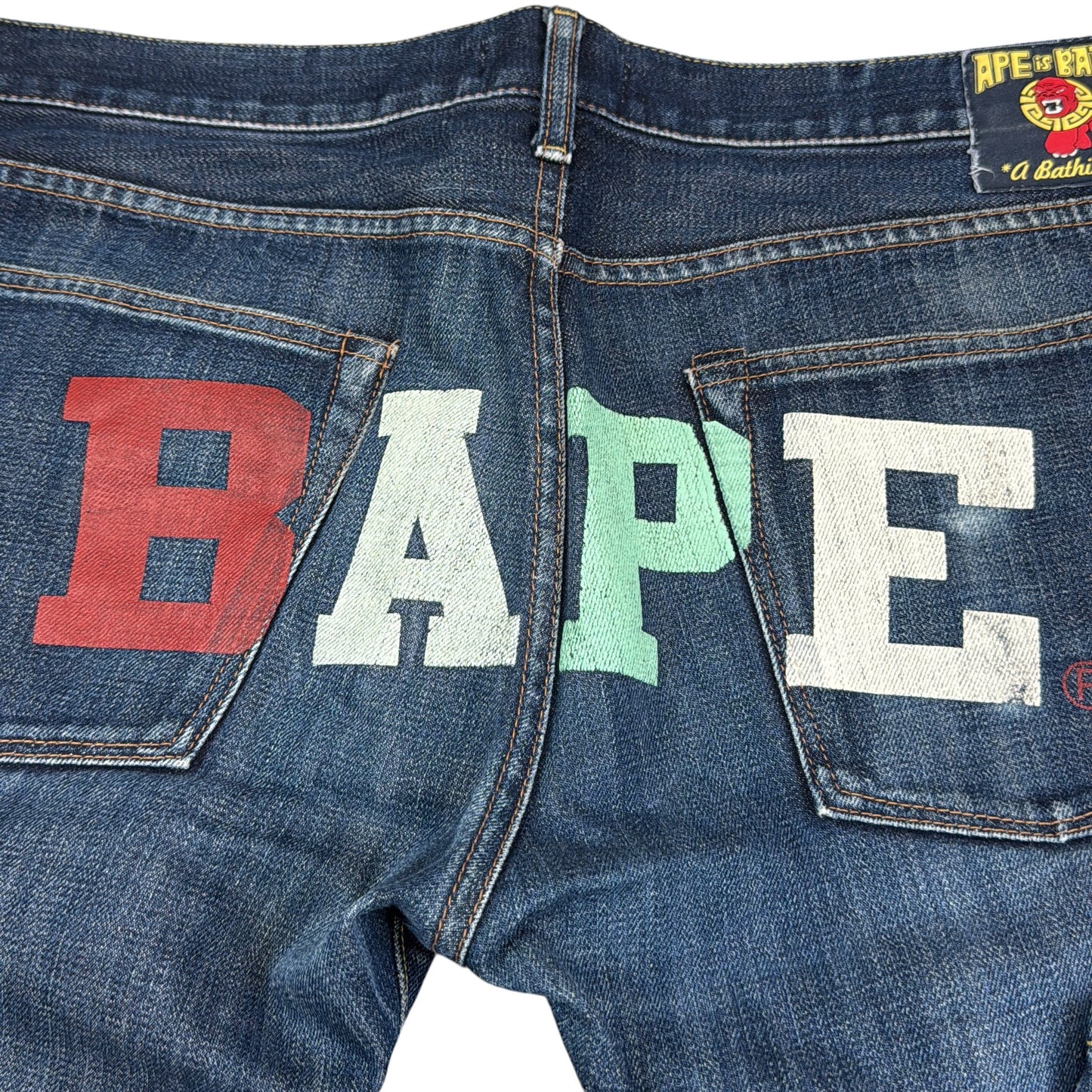 2009 Bape store Sendai spellout jeans (Medium)